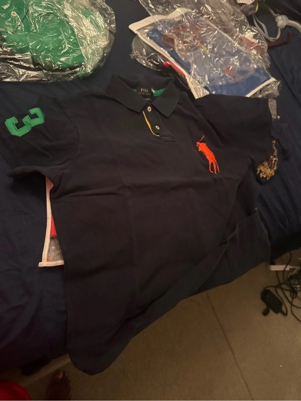 8 Men’s Ralph Lauren polo  shirts, $50 each
